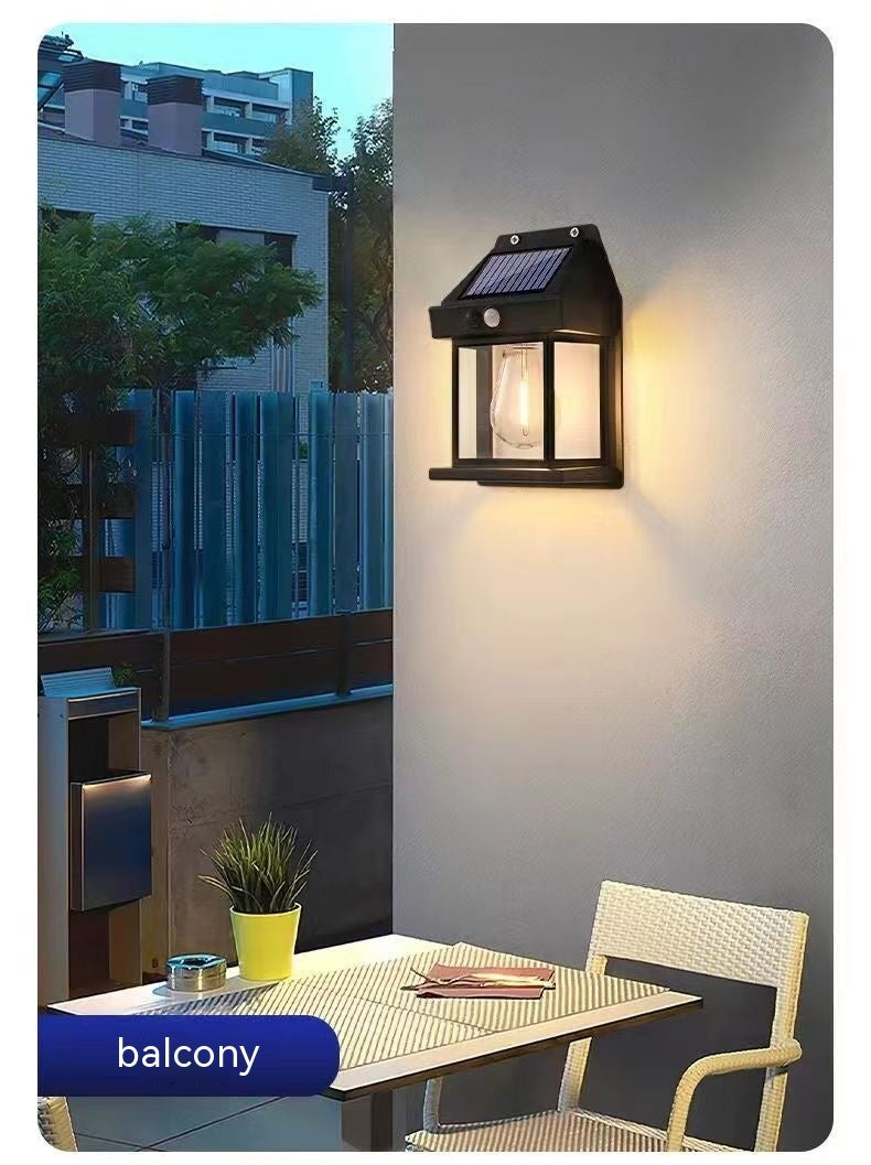 Waterproof solar wall lamp with warm tungsten lighting